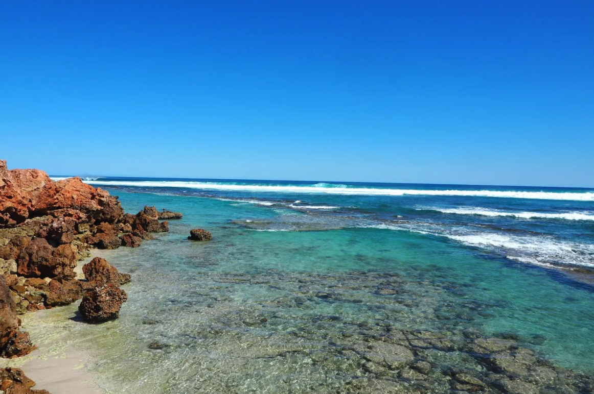 The Aquarium Nyinggulu Coastal Reserves Rocky shoreline and turquoise water at The Aquarium in Nyinggulu Coastal Reserves
